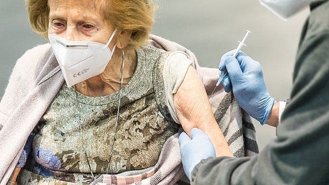 To help vaccinate the world, Biden needs to step outside of his political tribe